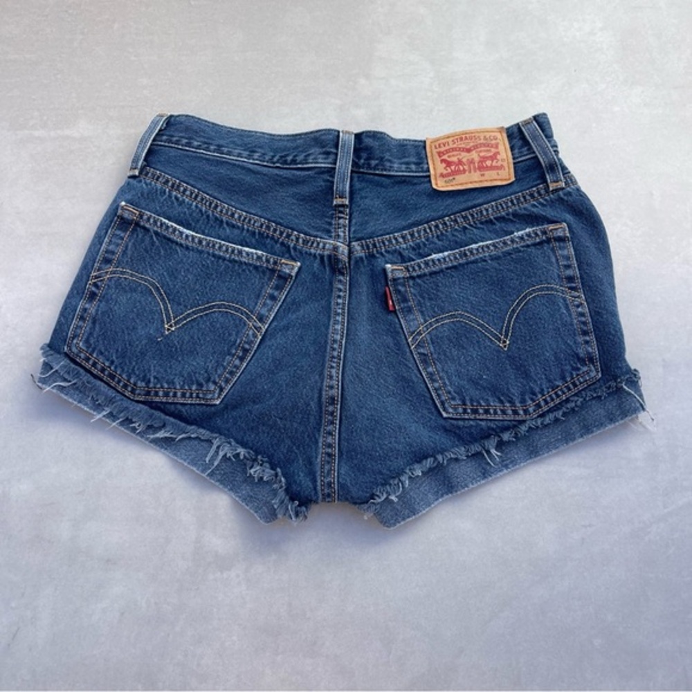 Levi’s 501 high-rise dark wash blue denim cut-off shorts